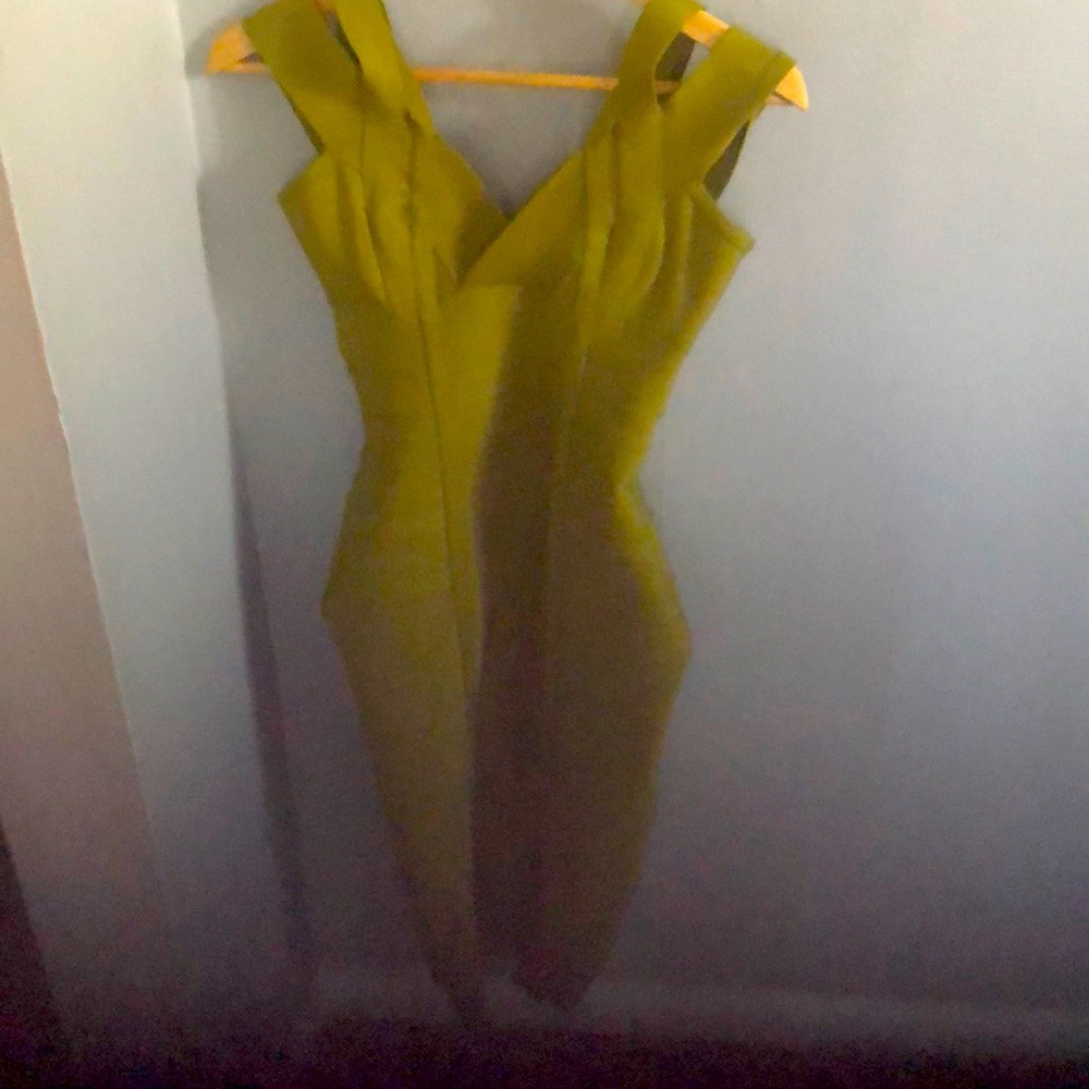 House of CB dress zipper in the back also zips down and up